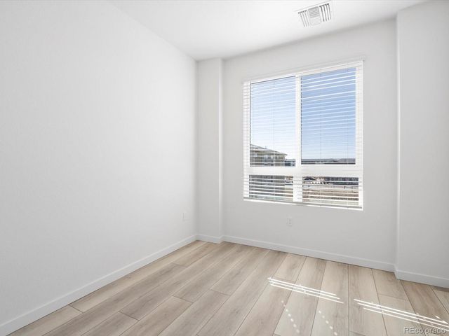 6153 N Ceylon Street 302, Denver, CO 80239