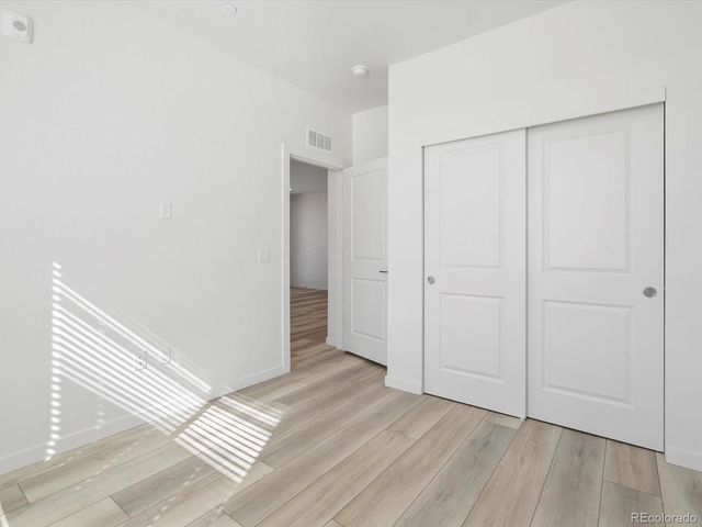 6153 N Ceylon Street 302, Denver, CO 80239