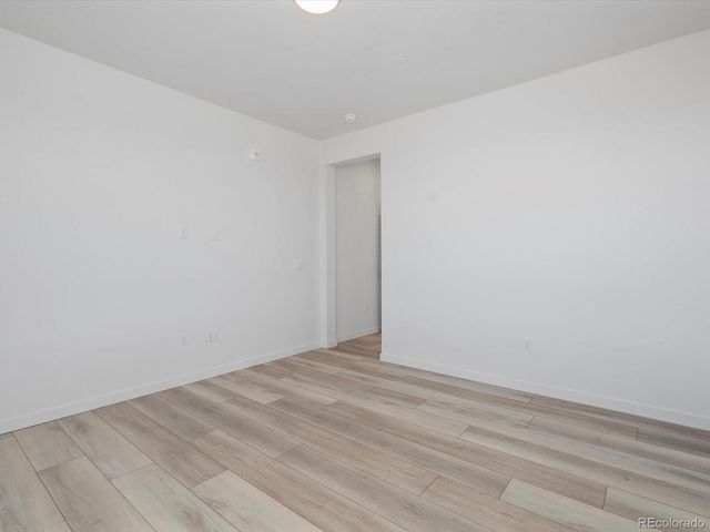 6153 N Ceylon Street 302, Denver, CO 80239