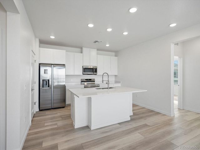 6153 N Ceylon Street 302, Denver, CO 80239