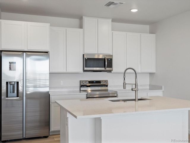 6153 N Ceylon Street 302, Denver, CO 80239