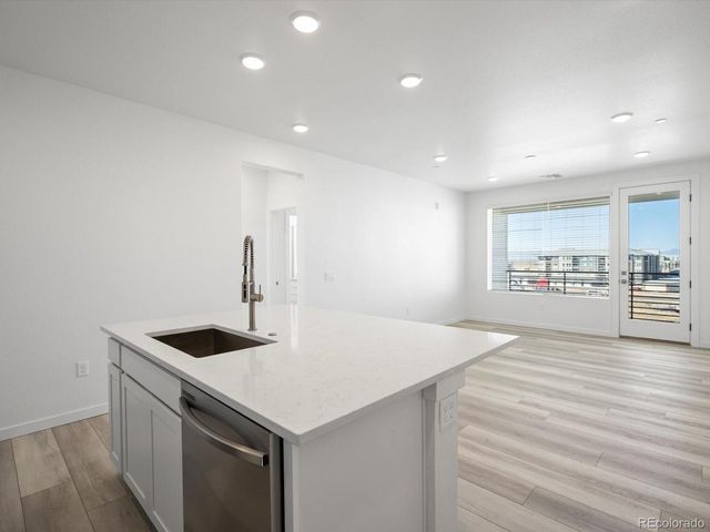 6153 N Ceylon Street 302, Denver, CO 80239