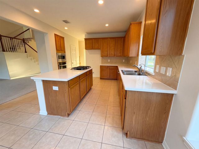 9019 Sunny Ridge Drive, Houston, TX 77095