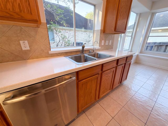 9019 Sunny Ridge Drive, Houston, TX 77095