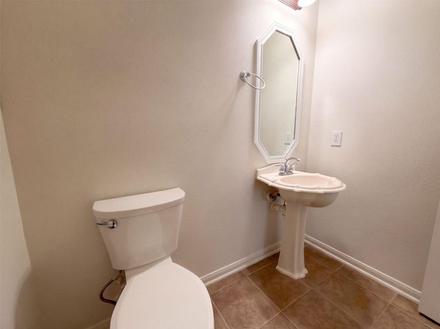 9019 Sunny Ridge Drive, Houston, TX 77095