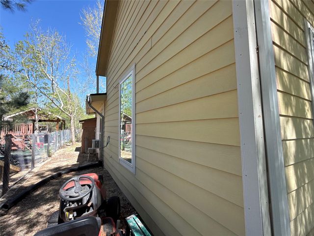 270 County Road 3409, Cleveland, TX 77327