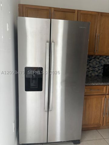 815 NE 213th Ter 815-04, Miami, FL 33179