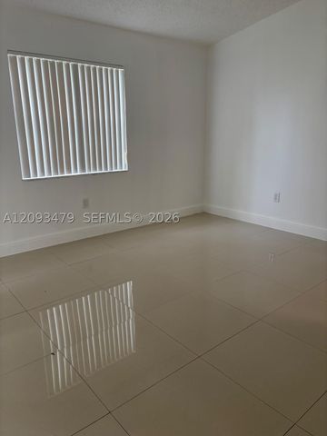 815 NE 213th Ter 815-04, Miami, FL 33179