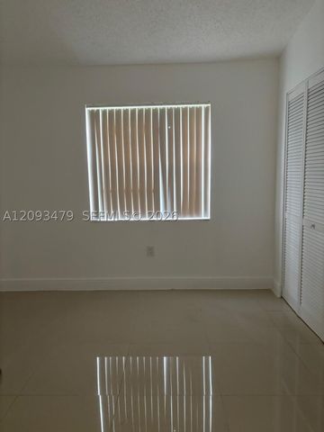 815 NE 213th Ter 815-04, Miami, FL 33179