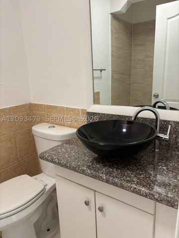 815 NE 213th Ter 815-04, Miami, FL 33179