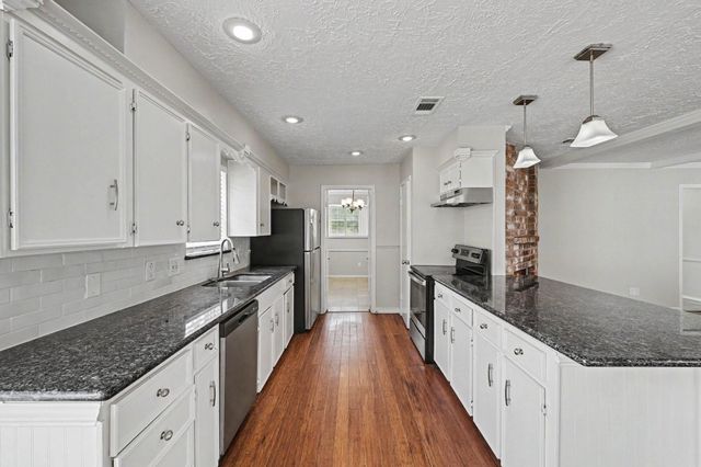 12219 Meadowhollow Drive, Meadows Place, TX 77477