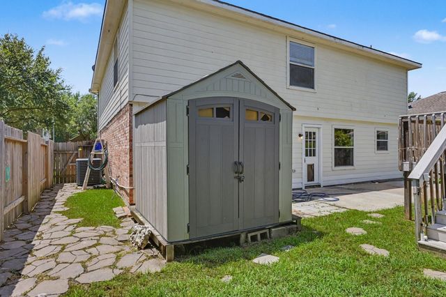 11910 Lois Lane, Pinehurst, TX 77362