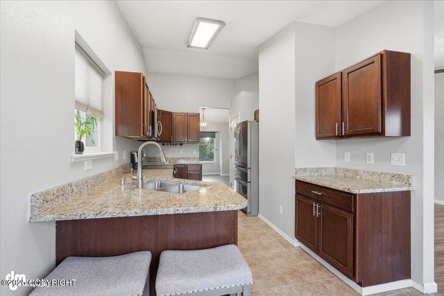 5720 Kenai Fjords Loop, Anchorage, AK 99502