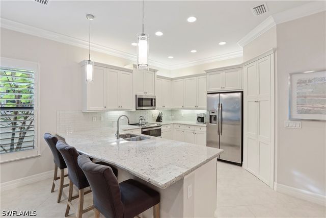 13435 Silktail DR, Naples, FL 34109