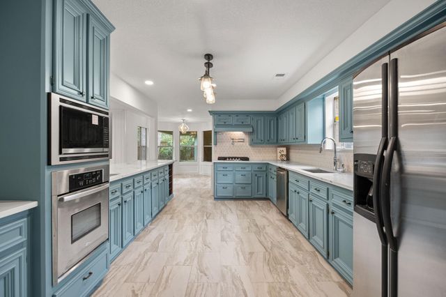 14710 Oak Bluff Court, Houston, TX 77070