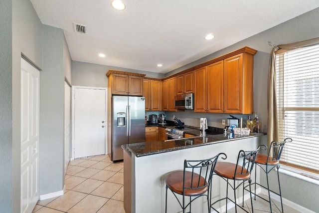 5023 Starblaze Drive, Greenacres, FL 33463