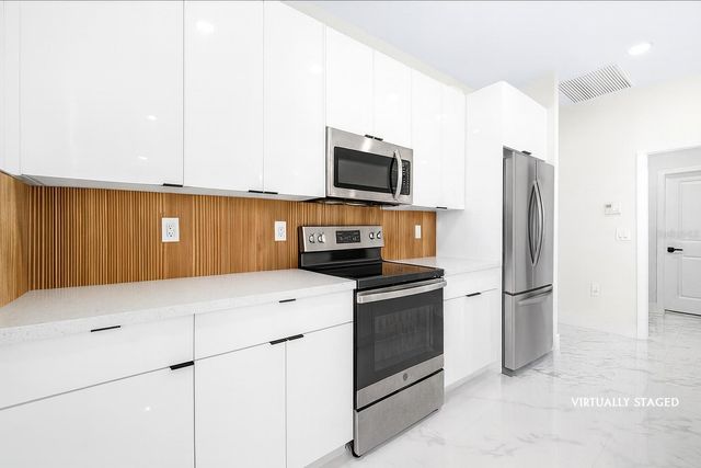 1015 MERRY STREET E, Lehigh Acres, FL 33974