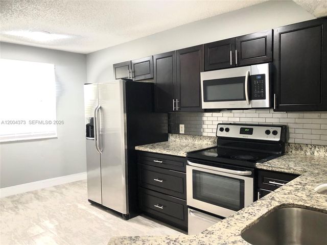 8761 Wiles Rd 306, Coral Springs, FL 33067