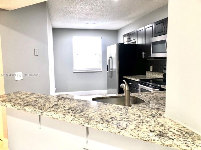 8761 Wiles Rd 306, Coral Springs, FL 33067