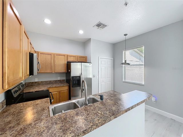 10157 RIDGEBLOOM AVENUE, Orlando, FL 32829