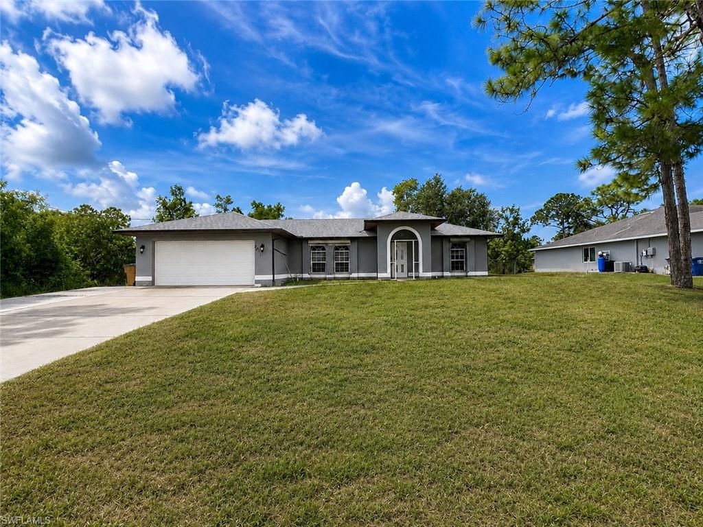 2411 Millie AVE S, LEHIGH ACRES, FL 33973 — exterior