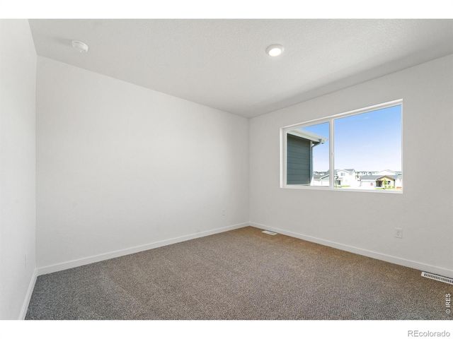 3917 Green Court, Evans, CO 80620