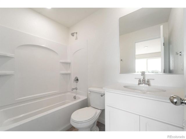 3917 Green Court, Evans, CO 80620