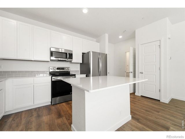 3917 Green Court, Evans, CO 80620