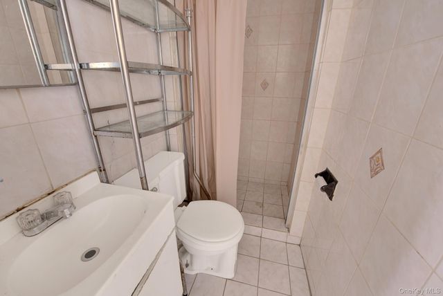 3033 72nd Street, East Elmhurst, NY 11370