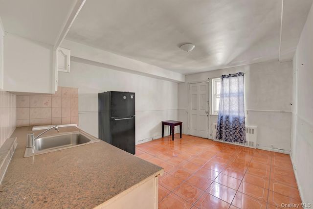 3033 72nd Street, East Elmhurst, NY 11370