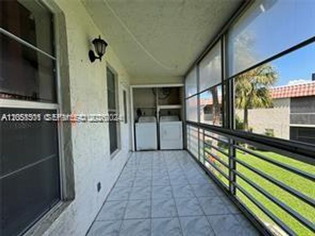 3777 NW 78th Avenue 8E, Davie, FL 33024