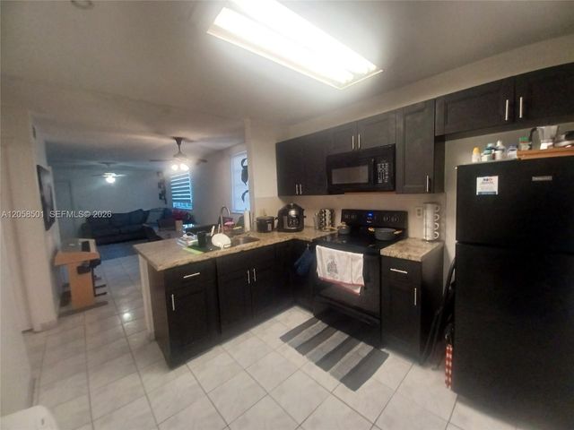 3777 NW 78th Avenue 8E, Davie, FL 33024