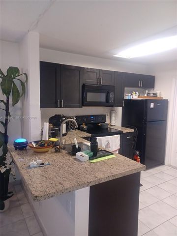 3777 NW 78th Avenue 8E, Davie, FL 33024