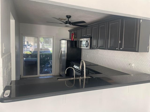 817 Crystal Lake Drive, Deerfield Beach, FL 33064