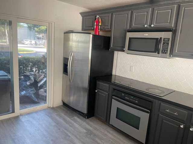 817 Crystal Lake Drive, Deerfield Beach, FL 33064