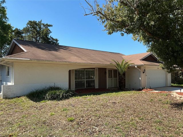 8702 VILLAGE MILL ROW, Hudson, FL 34667