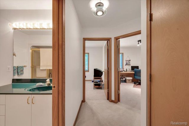 250 Woodcreek Court, Commerce Charter Township, MI 48390