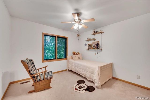 250 Woodcreek Court, Commerce Charter Township, MI 48390