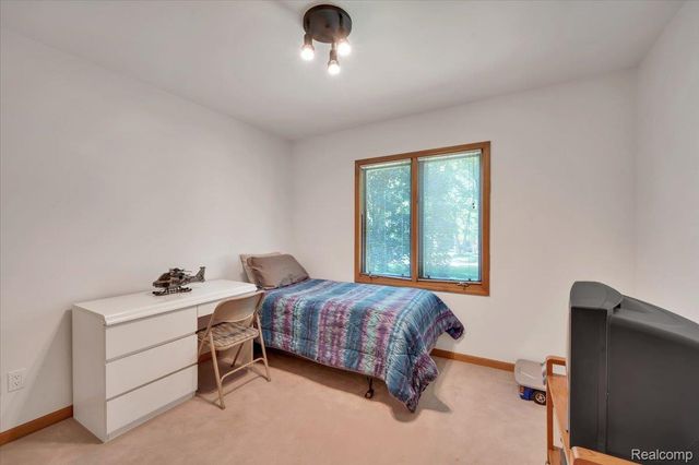 250 Woodcreek Court, Commerce Charter Township, MI 48390