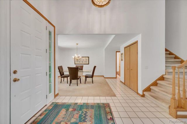 250 Woodcreek Court, Commerce Charter Township, MI 48390