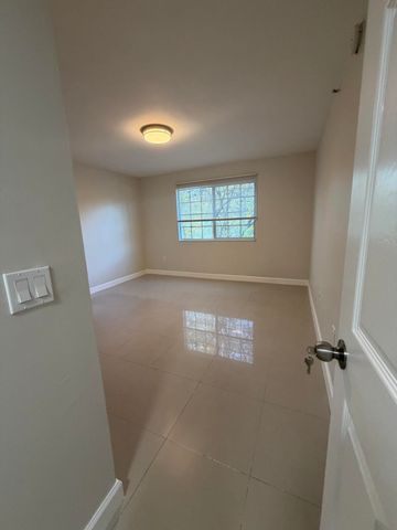 5031 Wiles Road 203, Coconut Creek, FL 33073