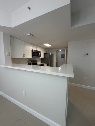 5031 Wiles Road 203, Coconut Creek, FL 33073