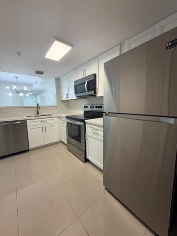 5031 Wiles Road 203, Coconut Creek, FL 33073