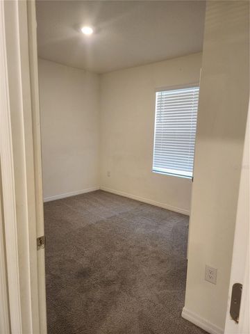 128 HICKORY COURSE LOOP, Ocala, FL 34472