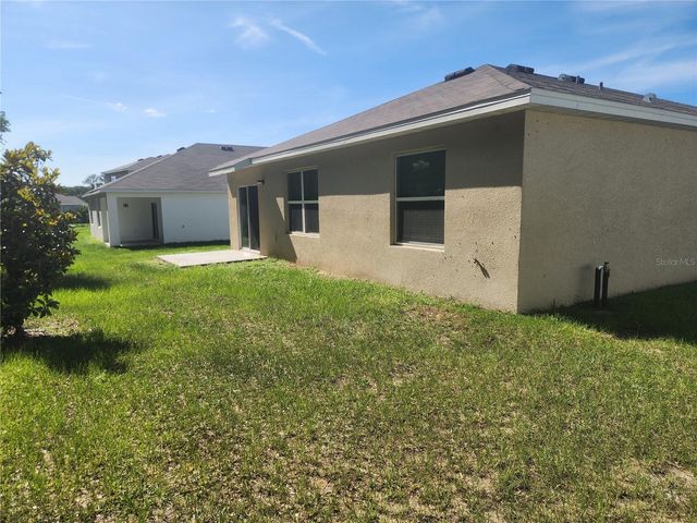 128 HICKORY COURSE LOOP, Ocala, FL 34472