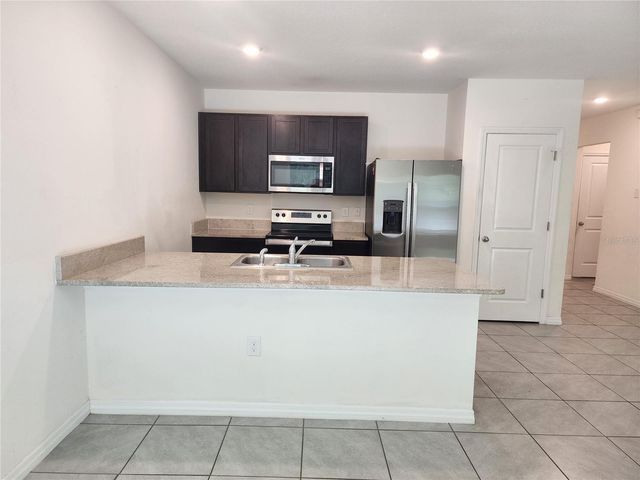 128 HICKORY COURSE LOOP, Ocala, FL 34472