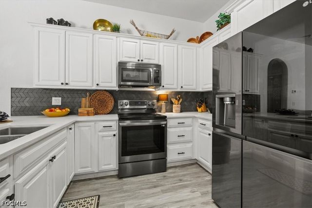3007 8th ST W, Lehigh Acres, FL 33971