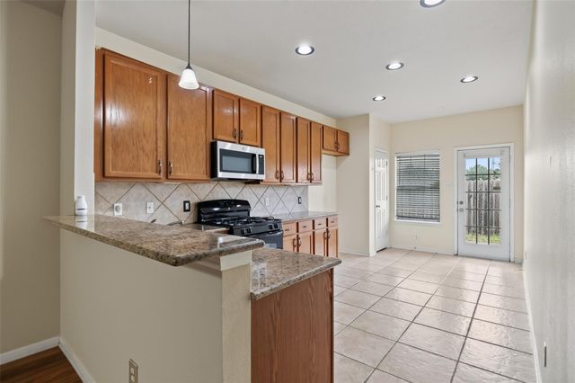 9762 Wheaton Edge Lane, Houston, TX 77095