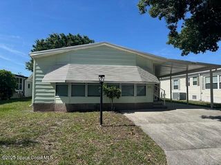 578 Dolphin Circle, Barefoot Bay, FL 32976