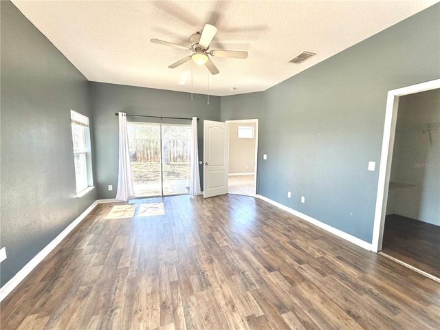 1044 LONGVILLE CIRCLE, Tavares, FL 32778